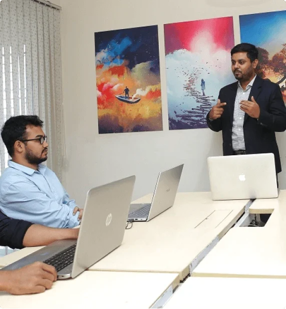 ReformedTech engineers in a working session at the Dhaka office