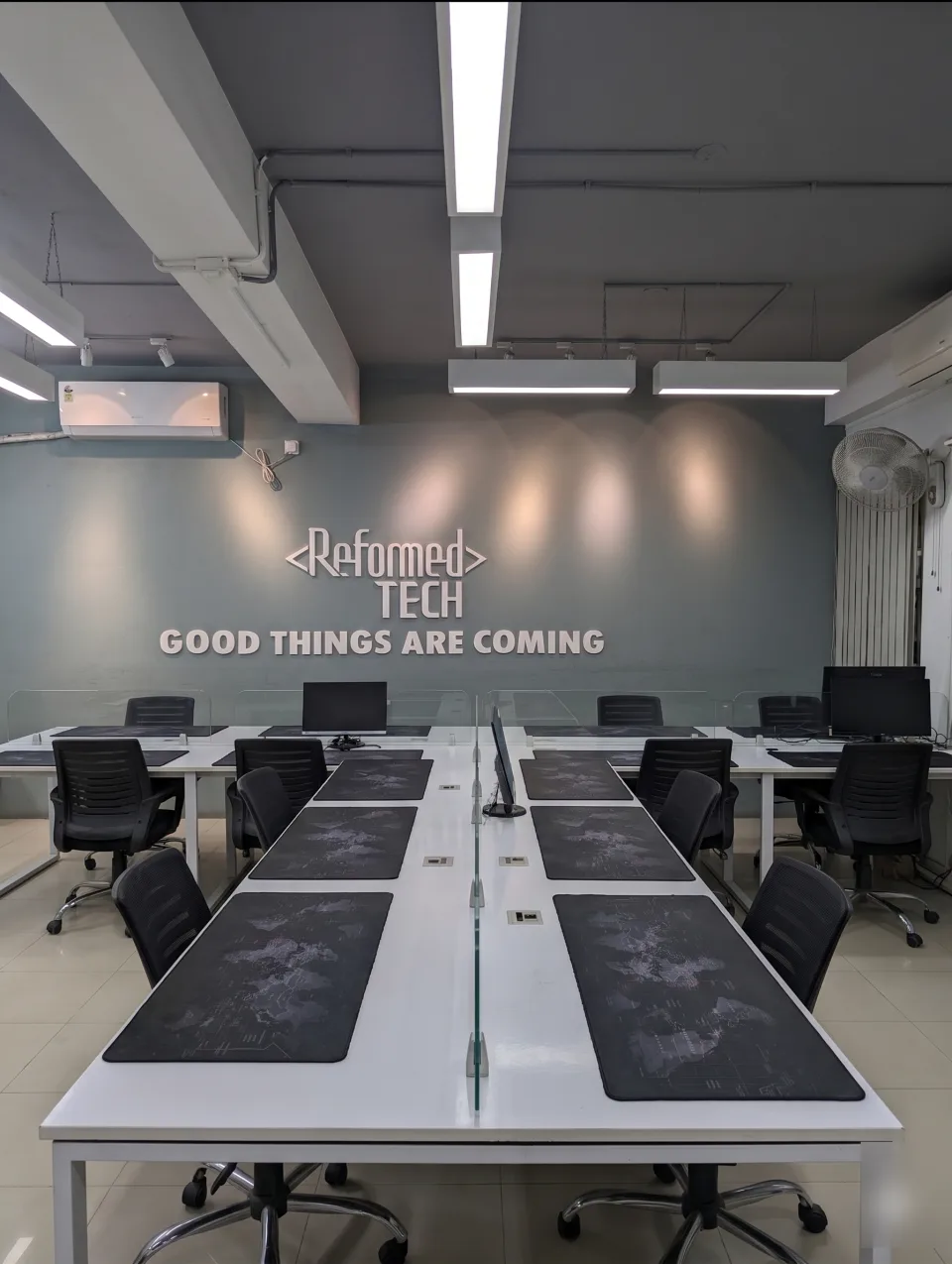 ReformedTech office workspace in Dhaka — desks ready for the engineering team