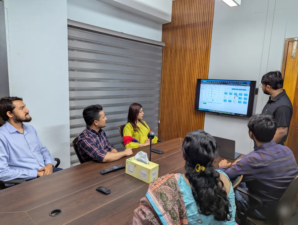 ReformedTech team reviewing a product demo together